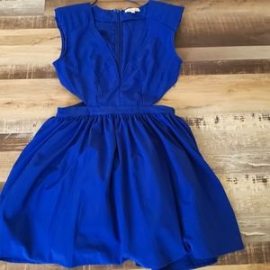Blue dress with cut out on the sides.